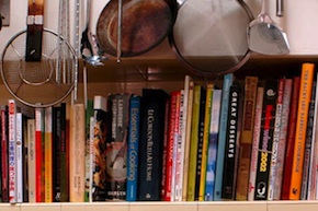 Cookbooks on kitchen shelf
