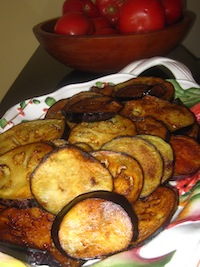 Eggplant and bowl of tomatoes
