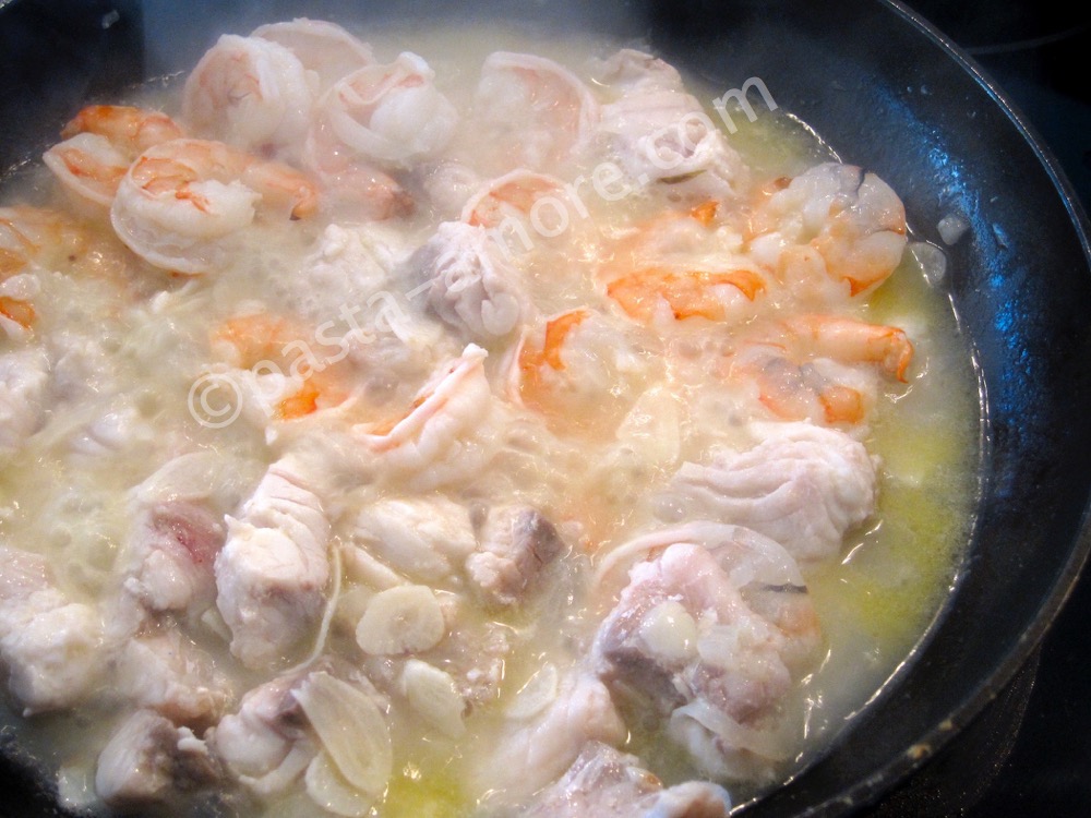 Sautéing the seafood soup step 2