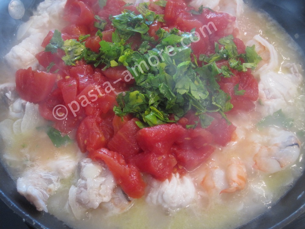 Saut�ing the seafood soup step 3
